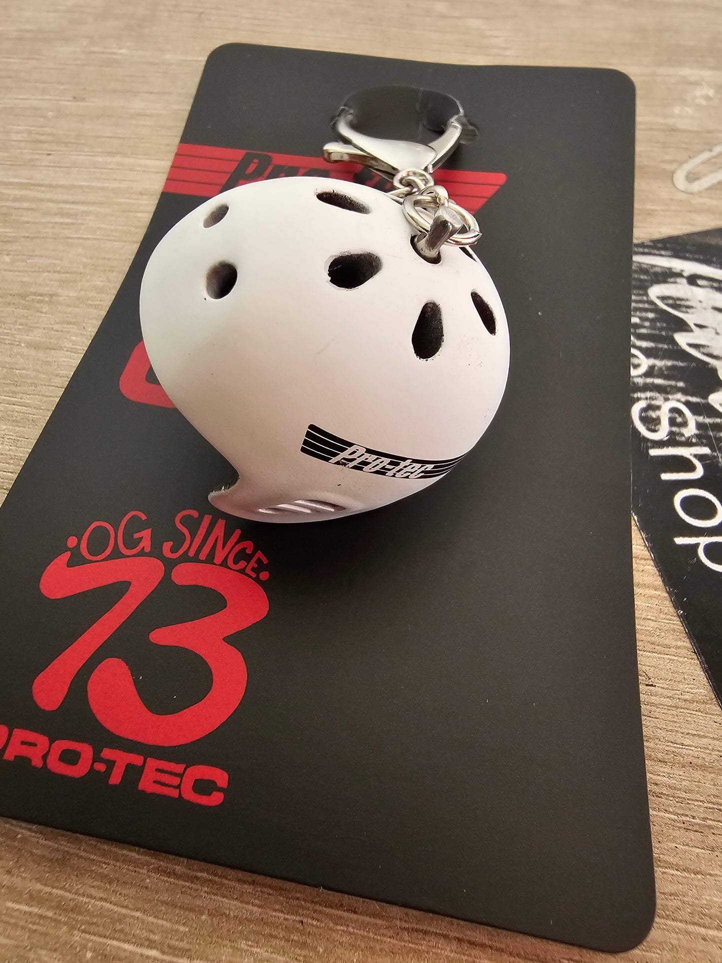 llavero de casco protec