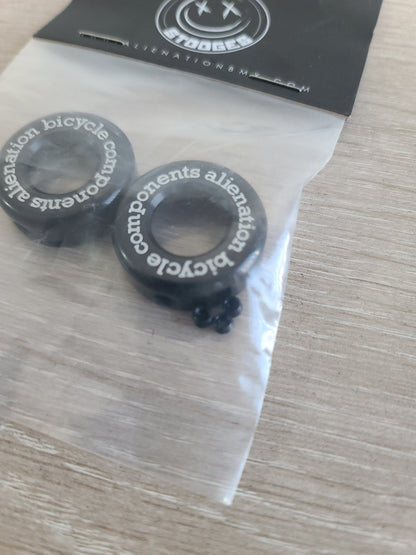Tapones de manubrio alienation